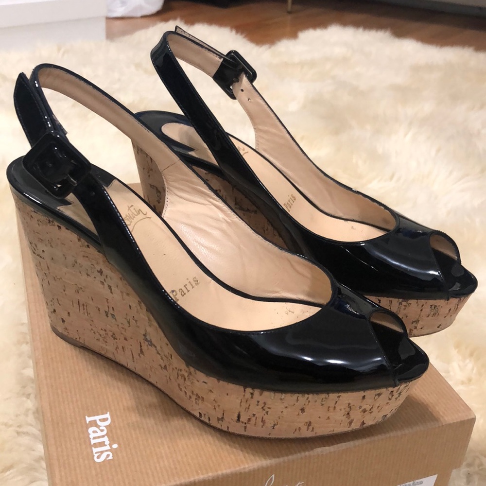 Used 
Christian Louboutin 6B.  USED BUT THEY HAVE A LOT OF LIFE LEFT